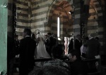 Bride and groom inside marble church. 